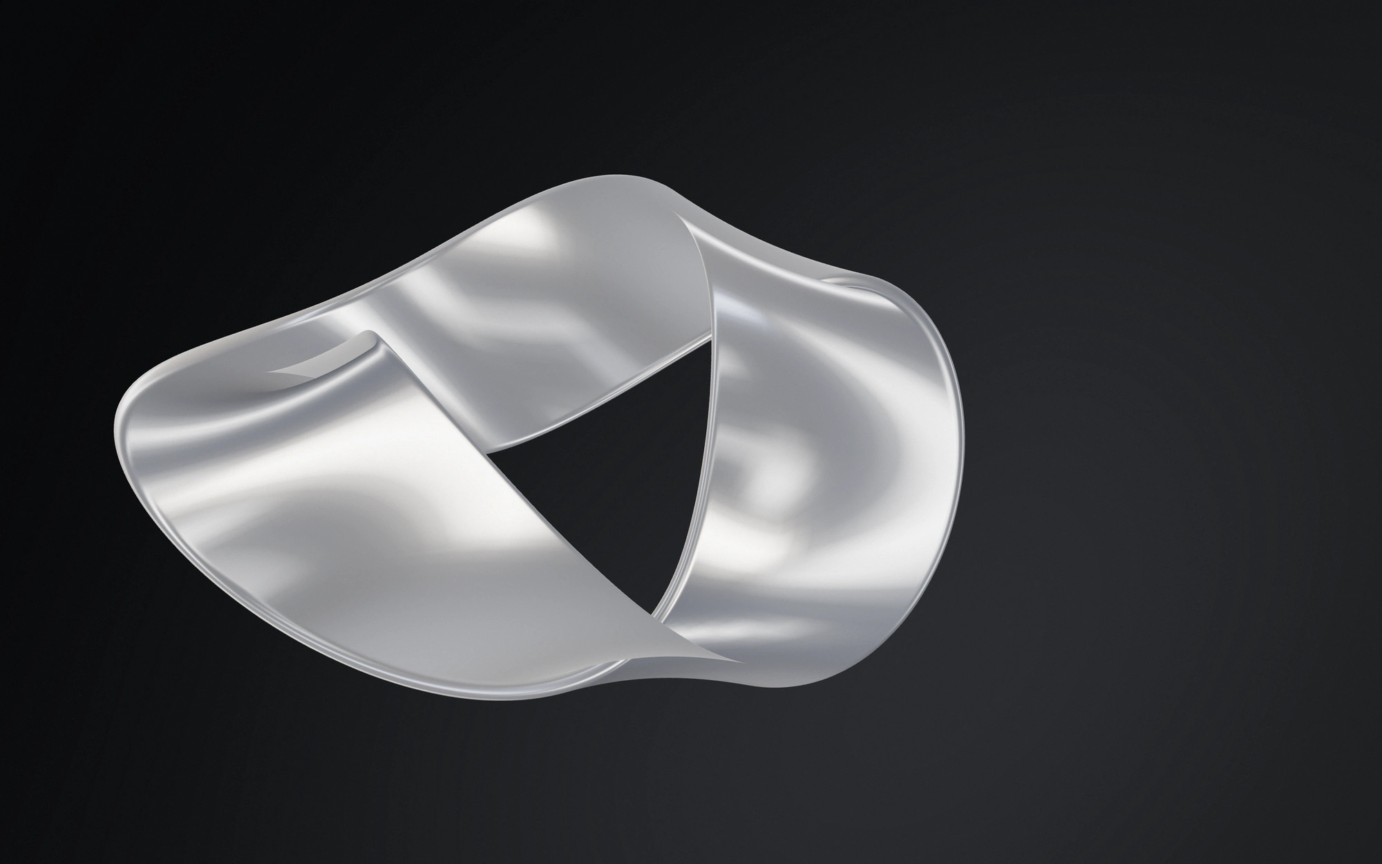 A white satin ribbon twisted into a loop on a graphite gradient background